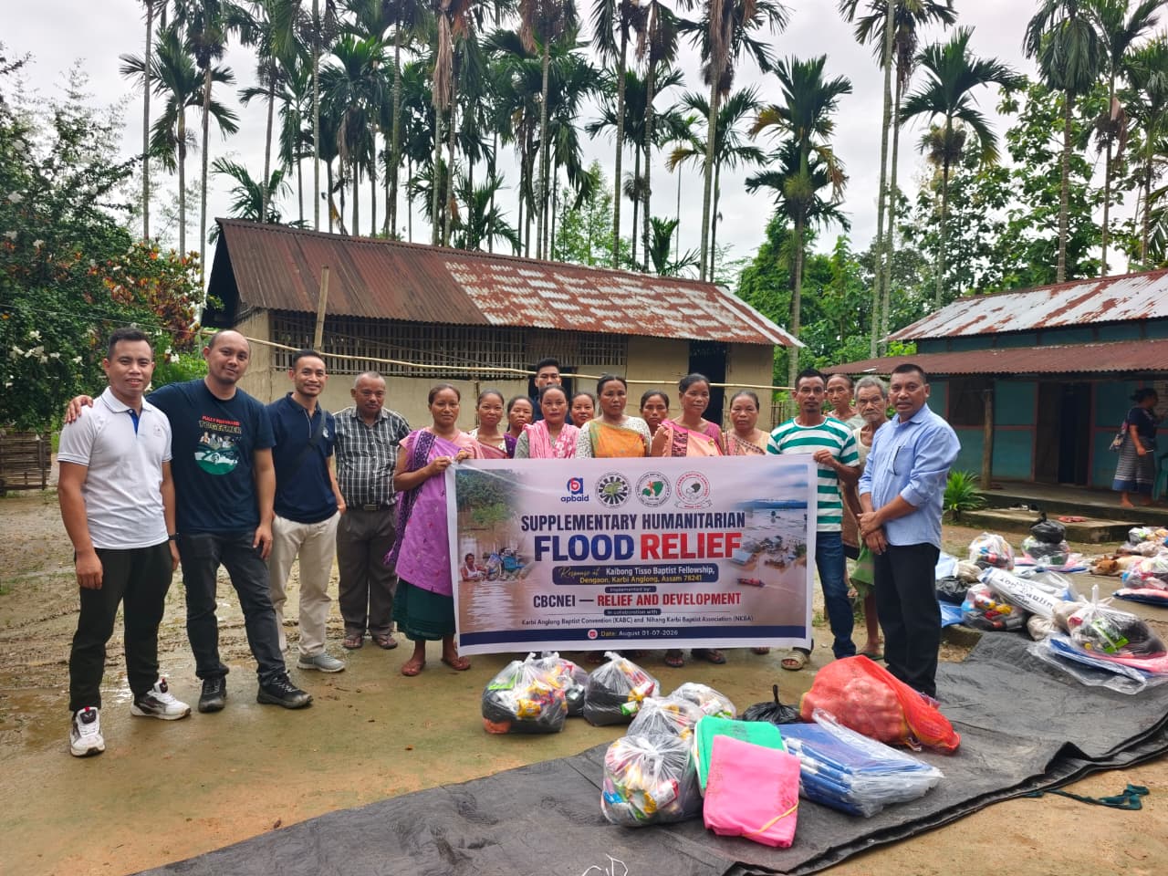 KABC and community members during flood-relief distribution at Kaibong Tisso Village, Dengaon.